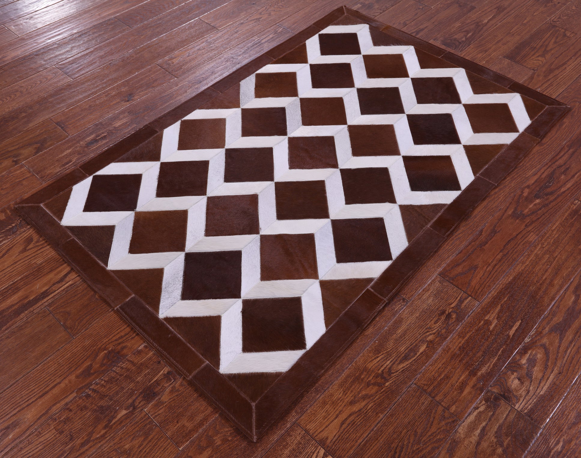 Brown & White Natural Cowhide Hand Stitched Patchwork Rug - 3' 3" X 5' 0" - Golden Nile