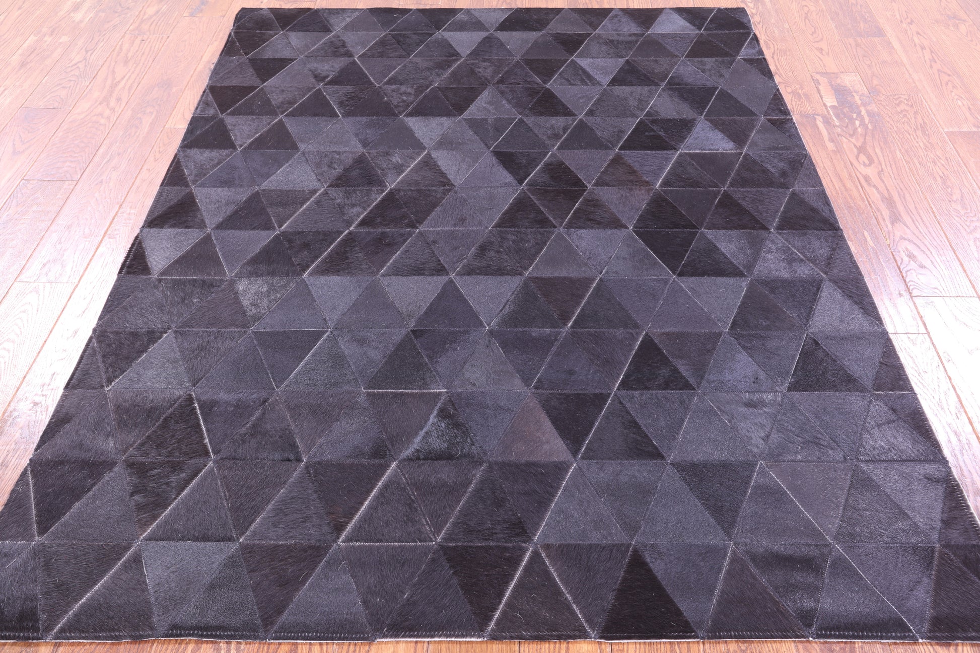 Black Natural Cowhide Hand Stitched Patchwork Rug - 5' 0" X 6' 6" - Golden Nile