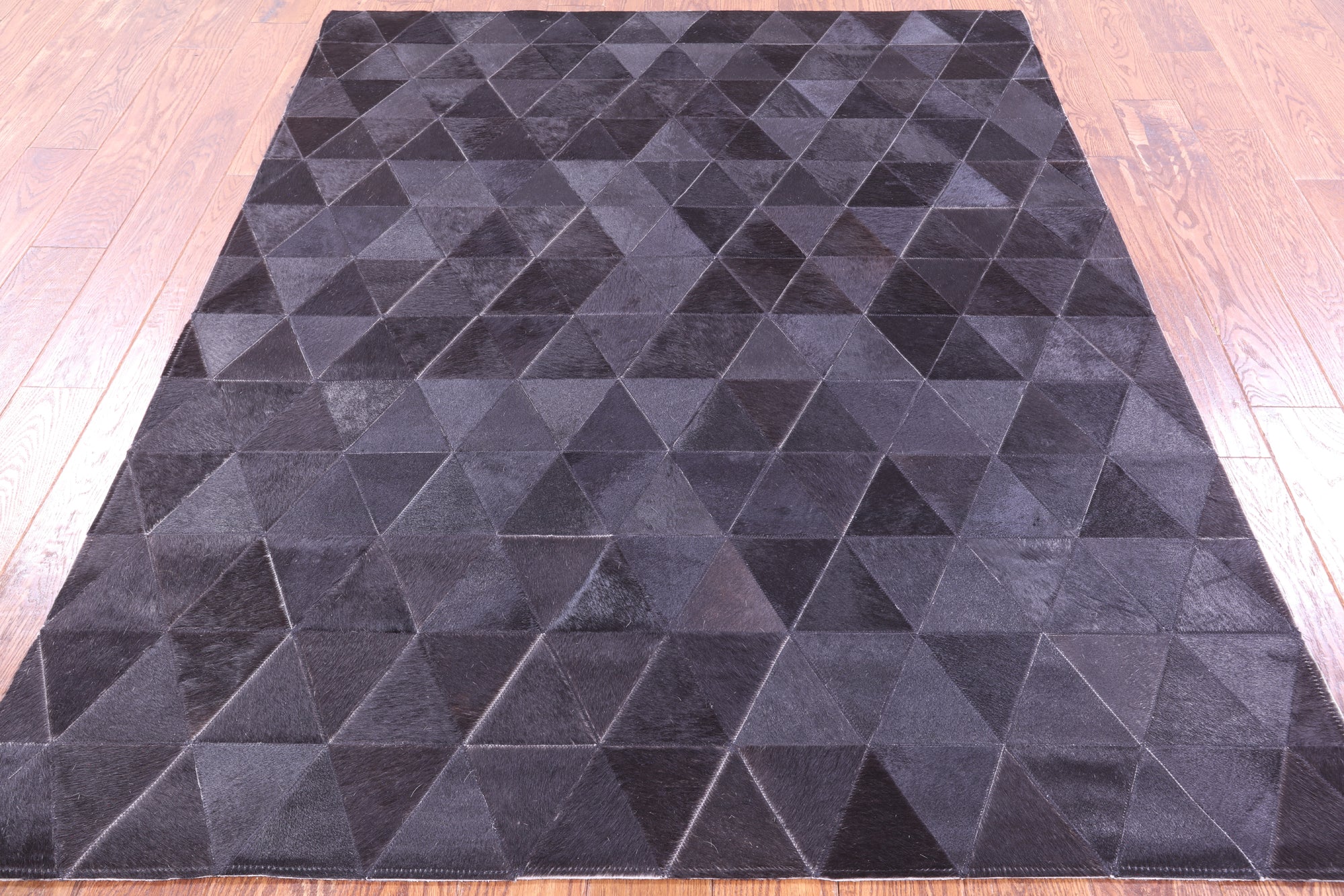 Black Natural Cowhide Hand Stitched Patchwork Rug - 5' 0" X 6' 6" - Golden Nile