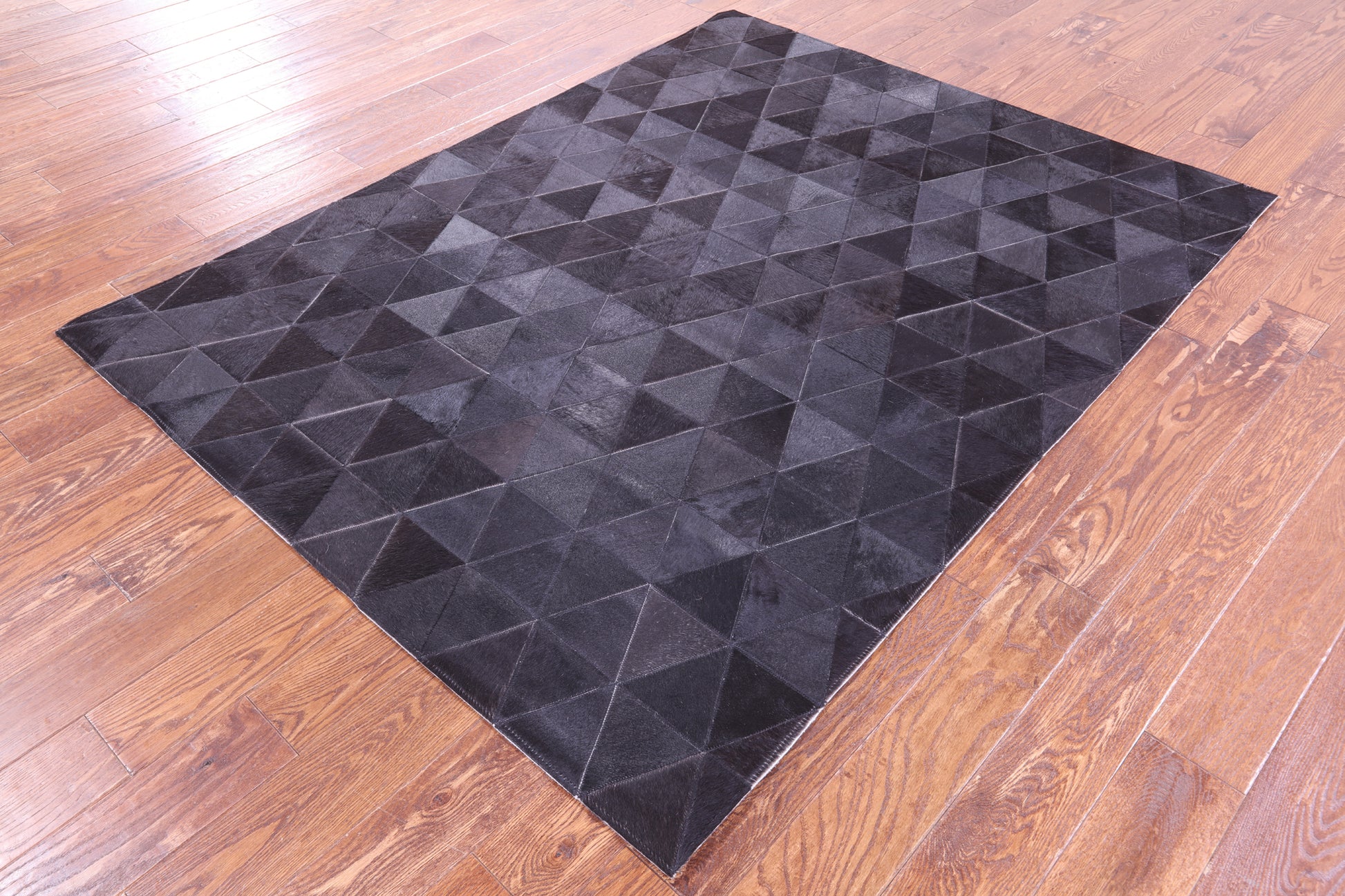 Black Natural Cowhide Hand Stitched Patchwork Rug - 5' 0" X 6' 6" - Golden Nile