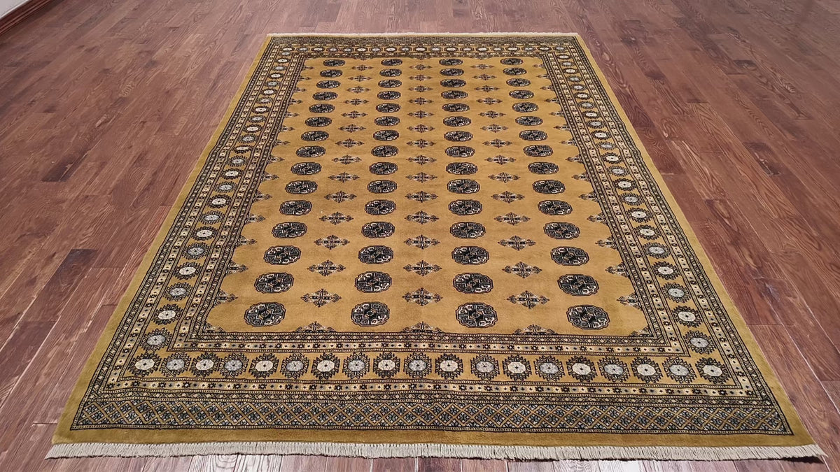 Load video: Gold Bokhara Hand Knotted Wool Rug - 7' 4" X 9' 7"