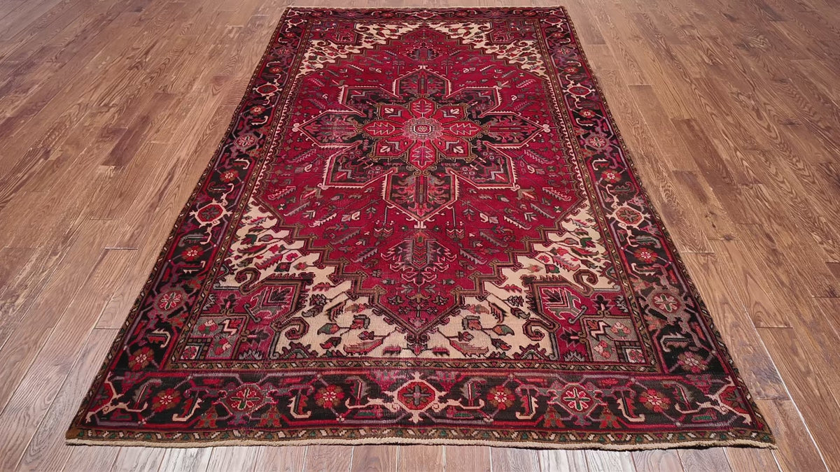 Load video: Rust Vintage Persian Heriz Serapi Handmade Wool Rug - 6' 3" X 9' 7"