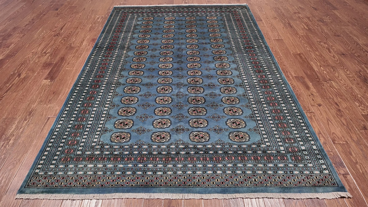 Load video: Blue Bokhara Hand Knotted Wool Rug - 6' 11" X 9' 8"