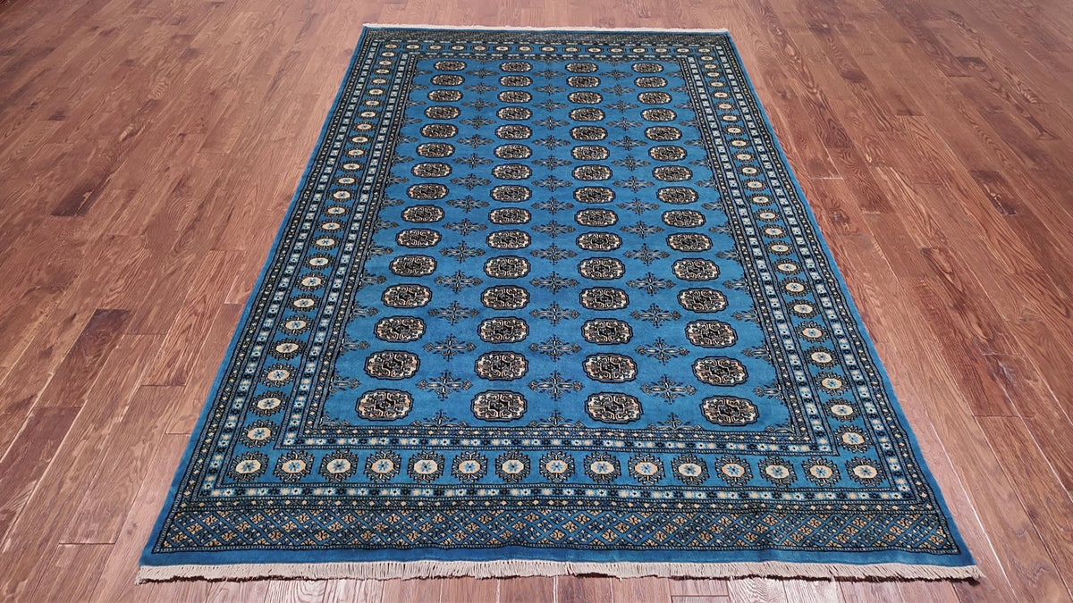 Load video: Blue Bokhara Hand-Knotted Wool Rug - 6' 3" X 9' 0"