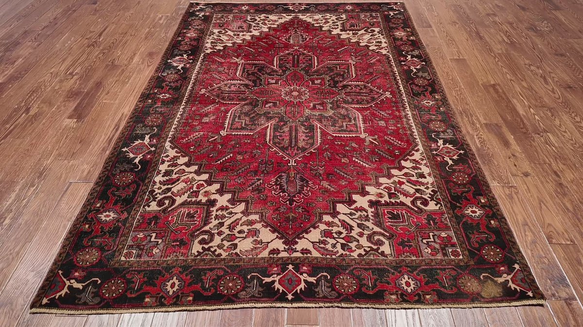 Load video: Red Vintage Persian Heriz Serapi Handmade Wool Rug - 6' 7" X 9' 3"