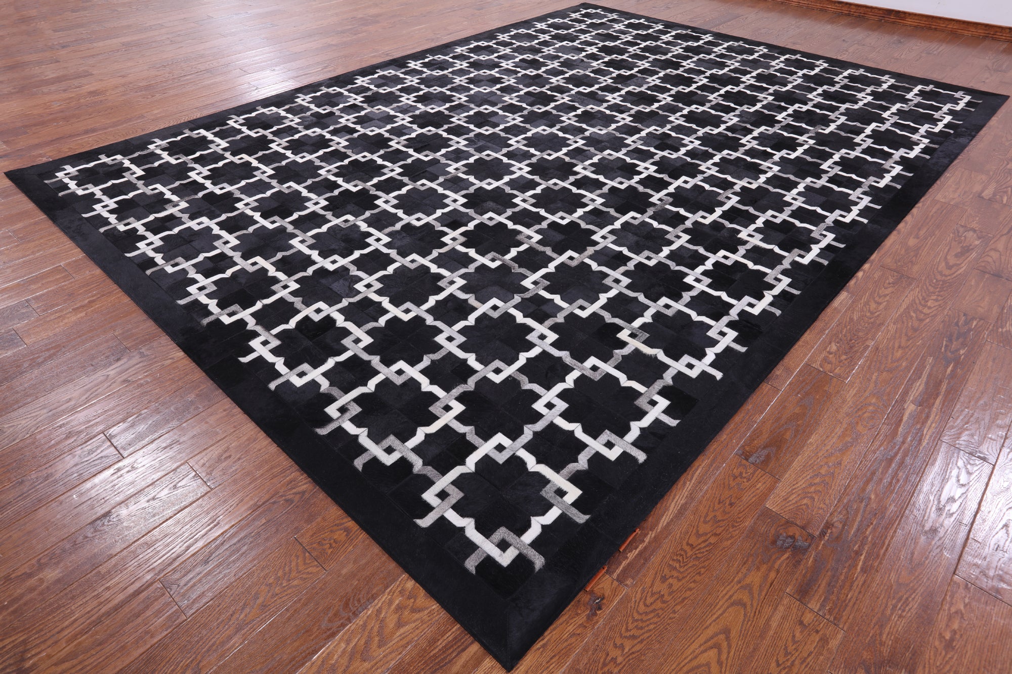 Black Natural Cowhide Hand Stitched Patchwork Rug - 10' 0" X 14' 0" - Golden Nile