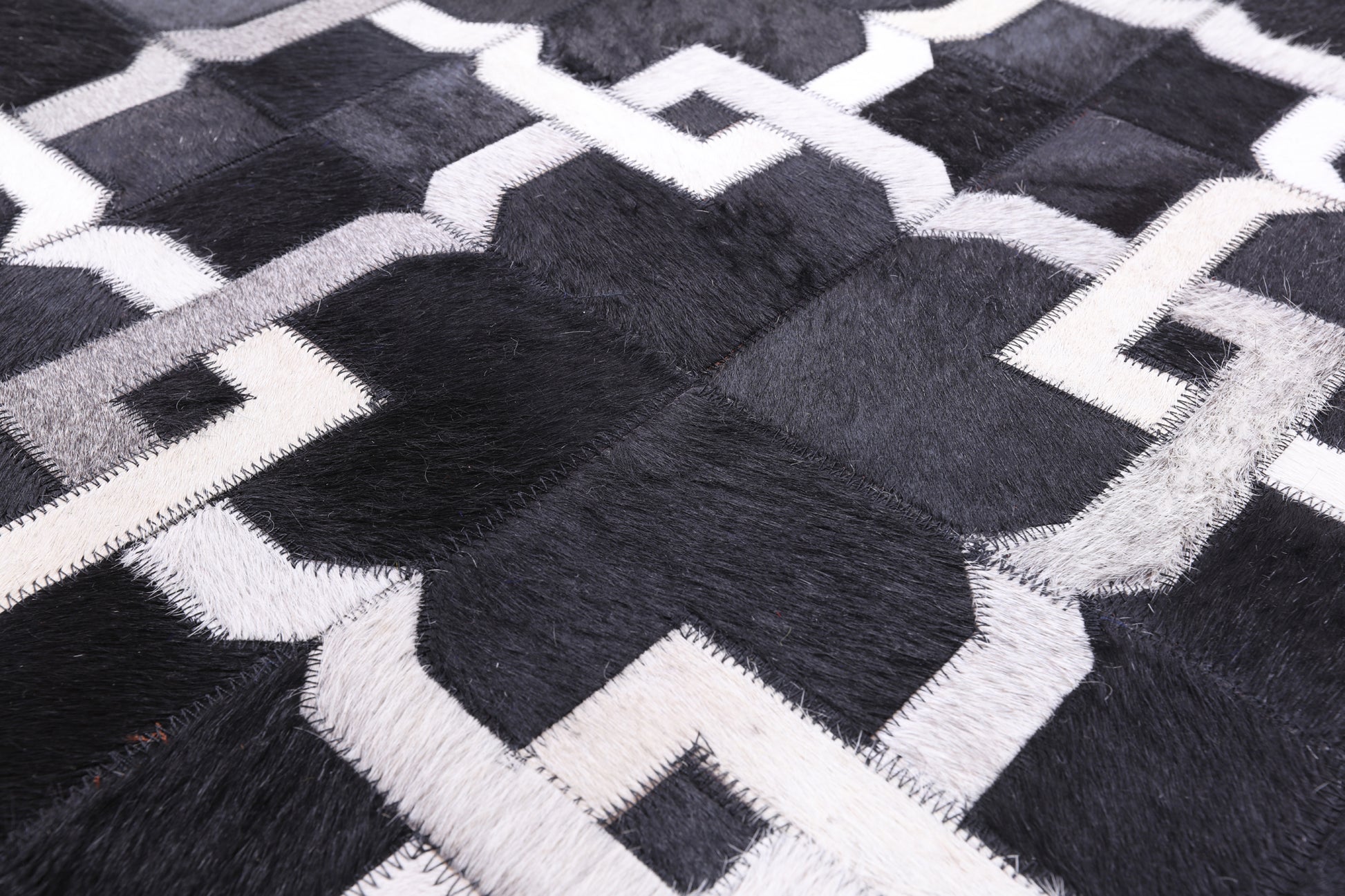 Black Natural Cowhide Hand Stitched Patchwork Rug - 5' 0" X 7' 0" - Golden Nile