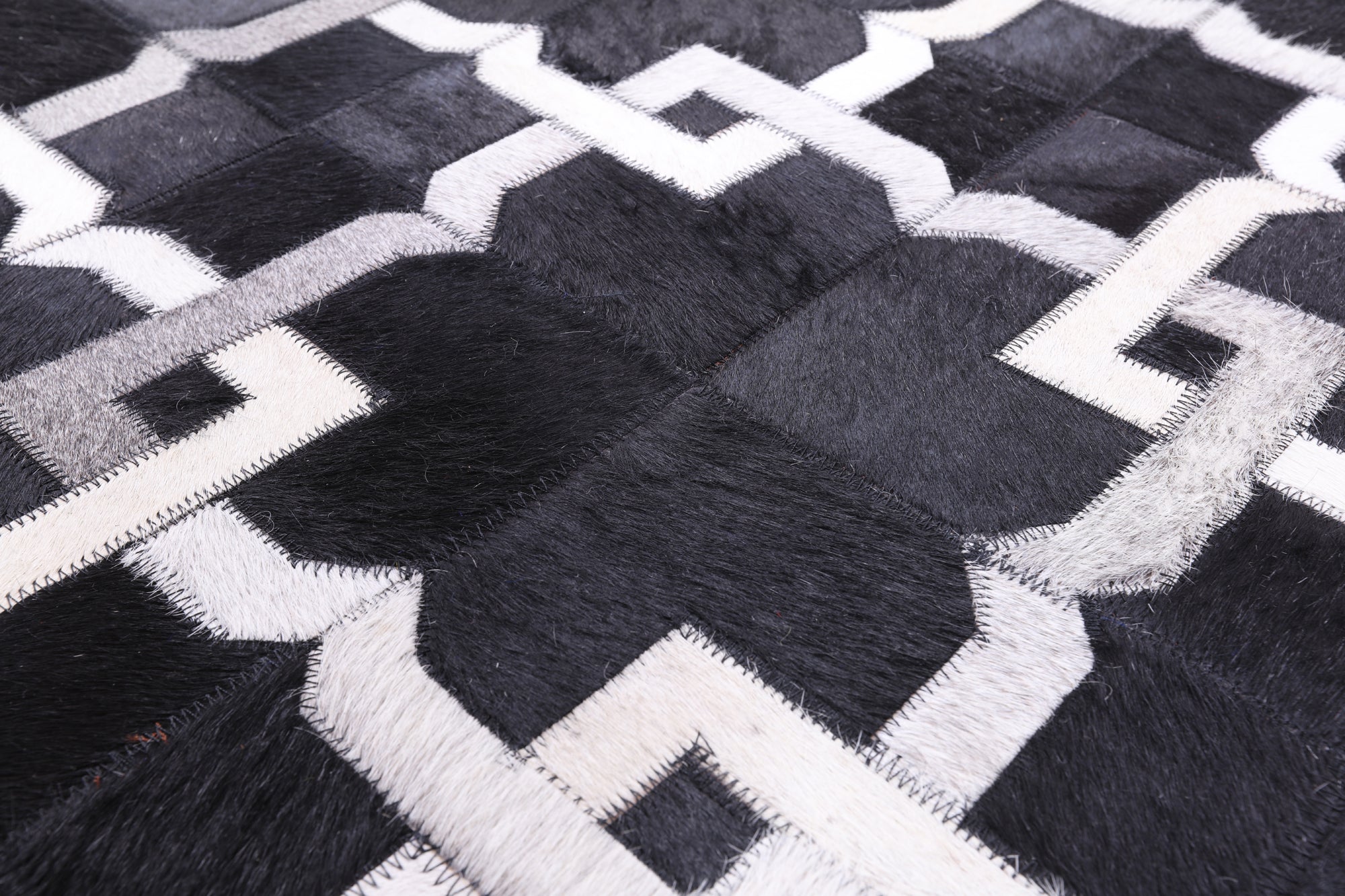 Black Natural Cowhide Hand Stitched Patchwork Rug - 5' 0" X 7' 0" - Golden Nile