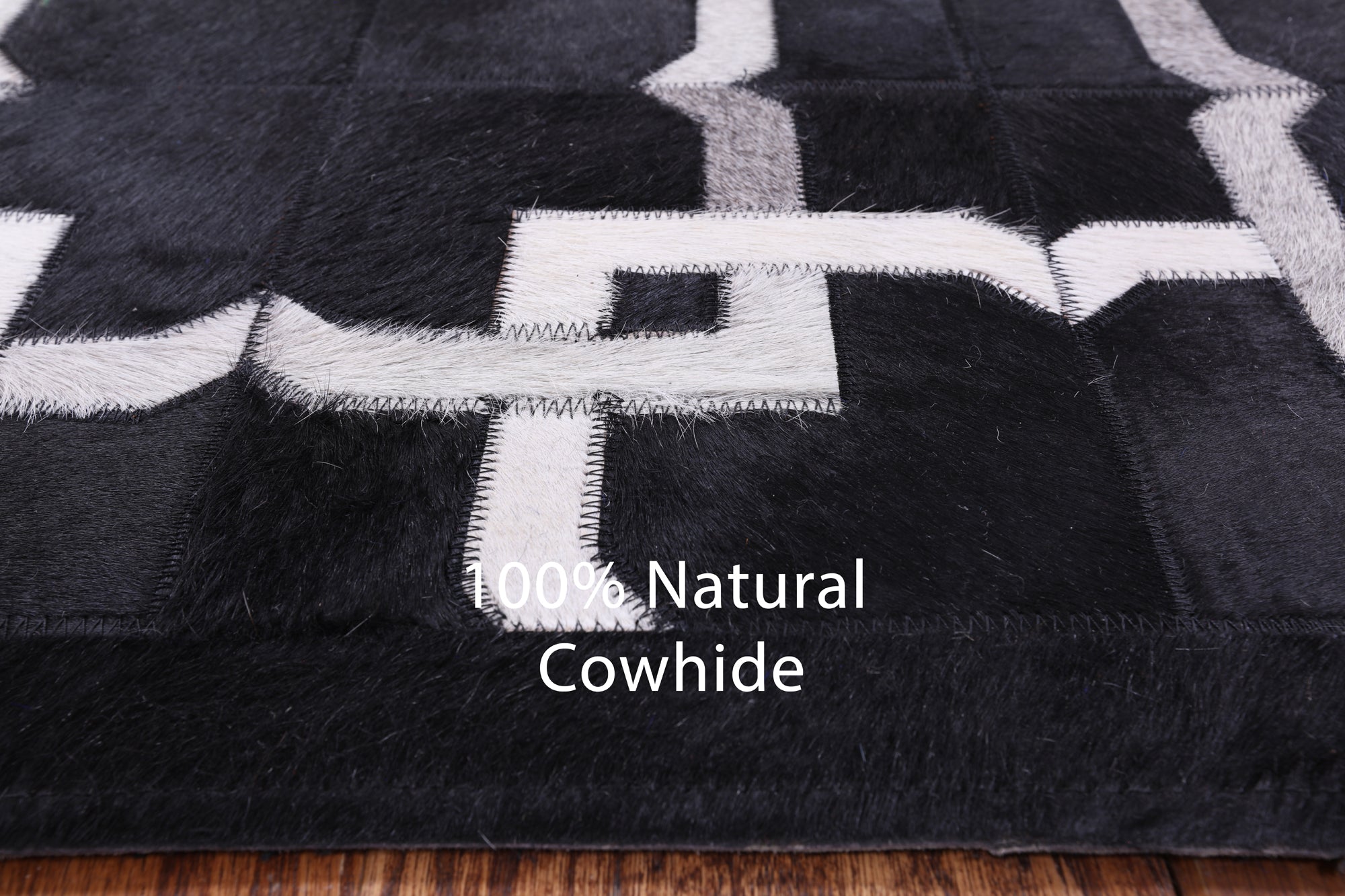 Black Natural Cowhide Hand Stitched Patchwork Rug - 5' 0" X 7' 0" - Golden Nile