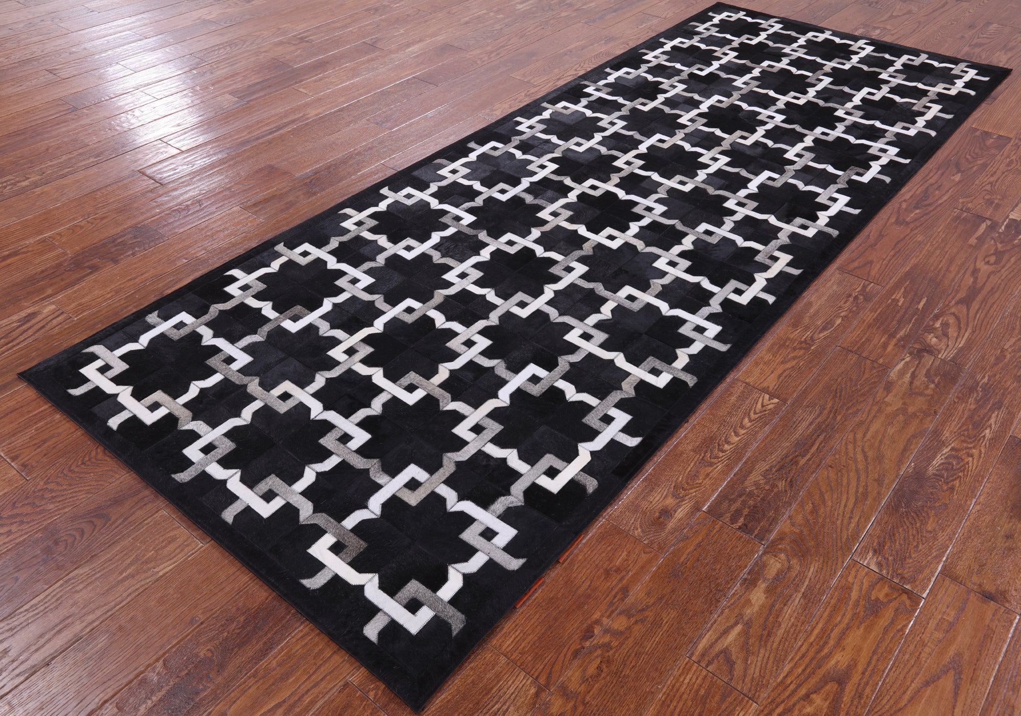 Black Natural Cowhide Hand Stitched Patchwork Runner Rug - 4' 0" X 10' 0" - Golden Nile