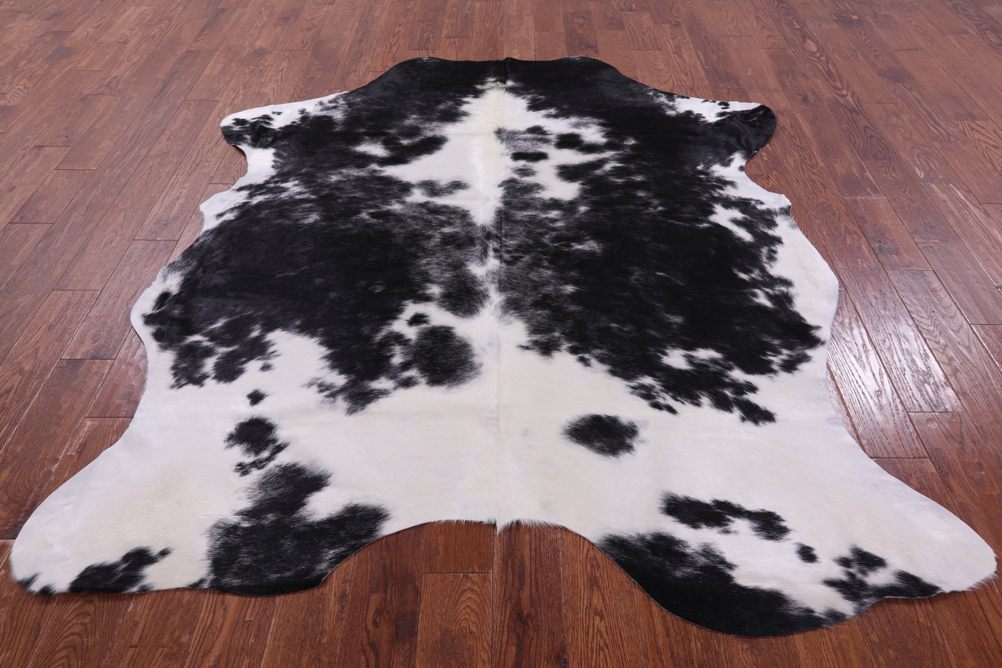 Black & White Natural Hair-On Cowhide Rug - 7' 7" X 6' 0" - Golden Nile
