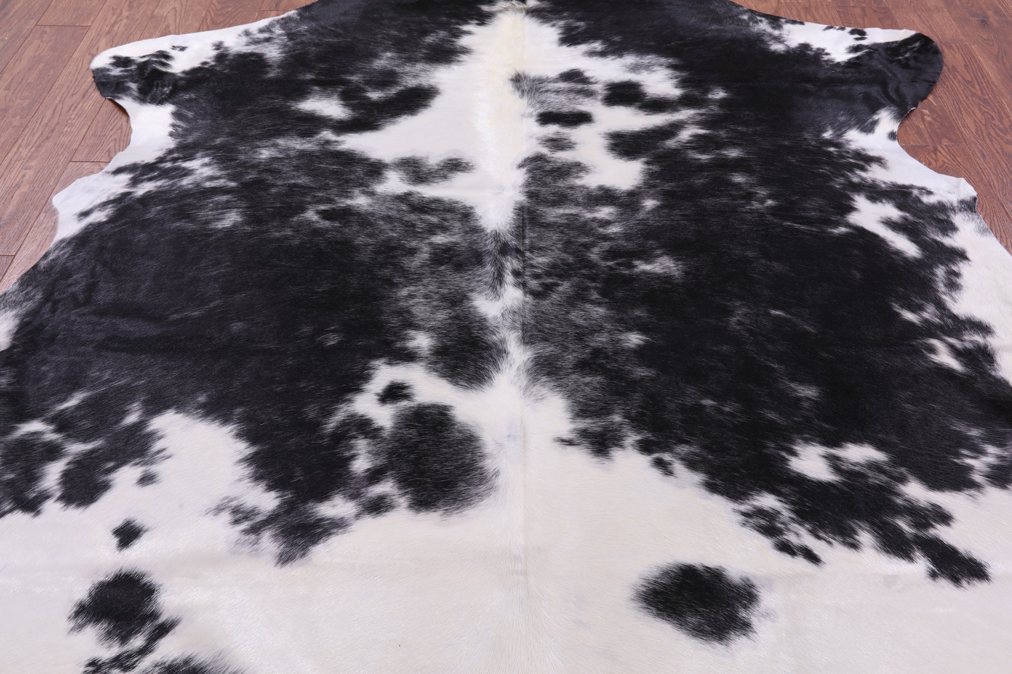 Black & White Natural Hair-On Cowhide Rug - 7' 7" X 6' 0" - Golden Nile