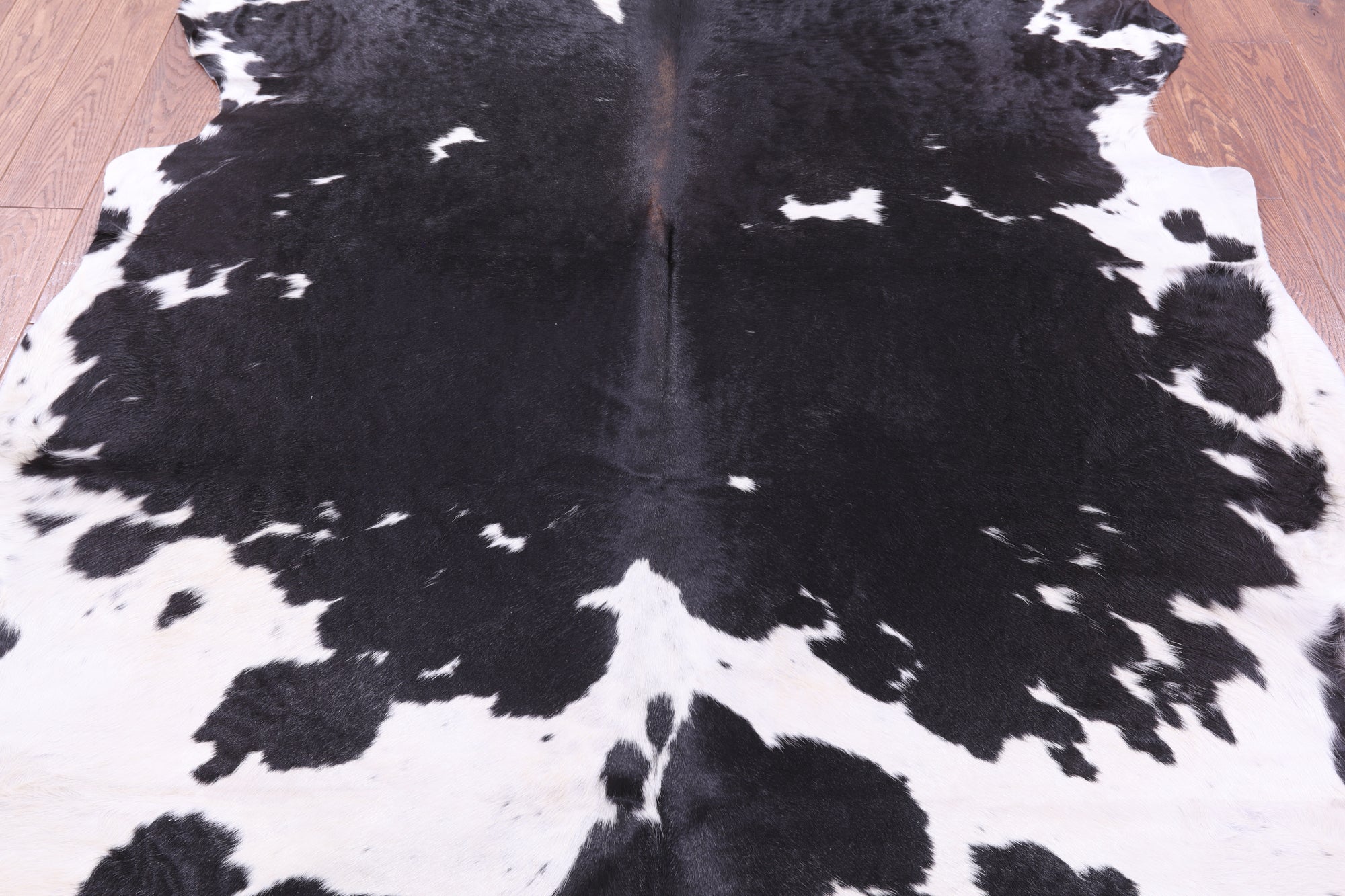 Black & White Natural Hair-On Cowhide Rug - 6' 11" X 6' 1" - Golden Nile