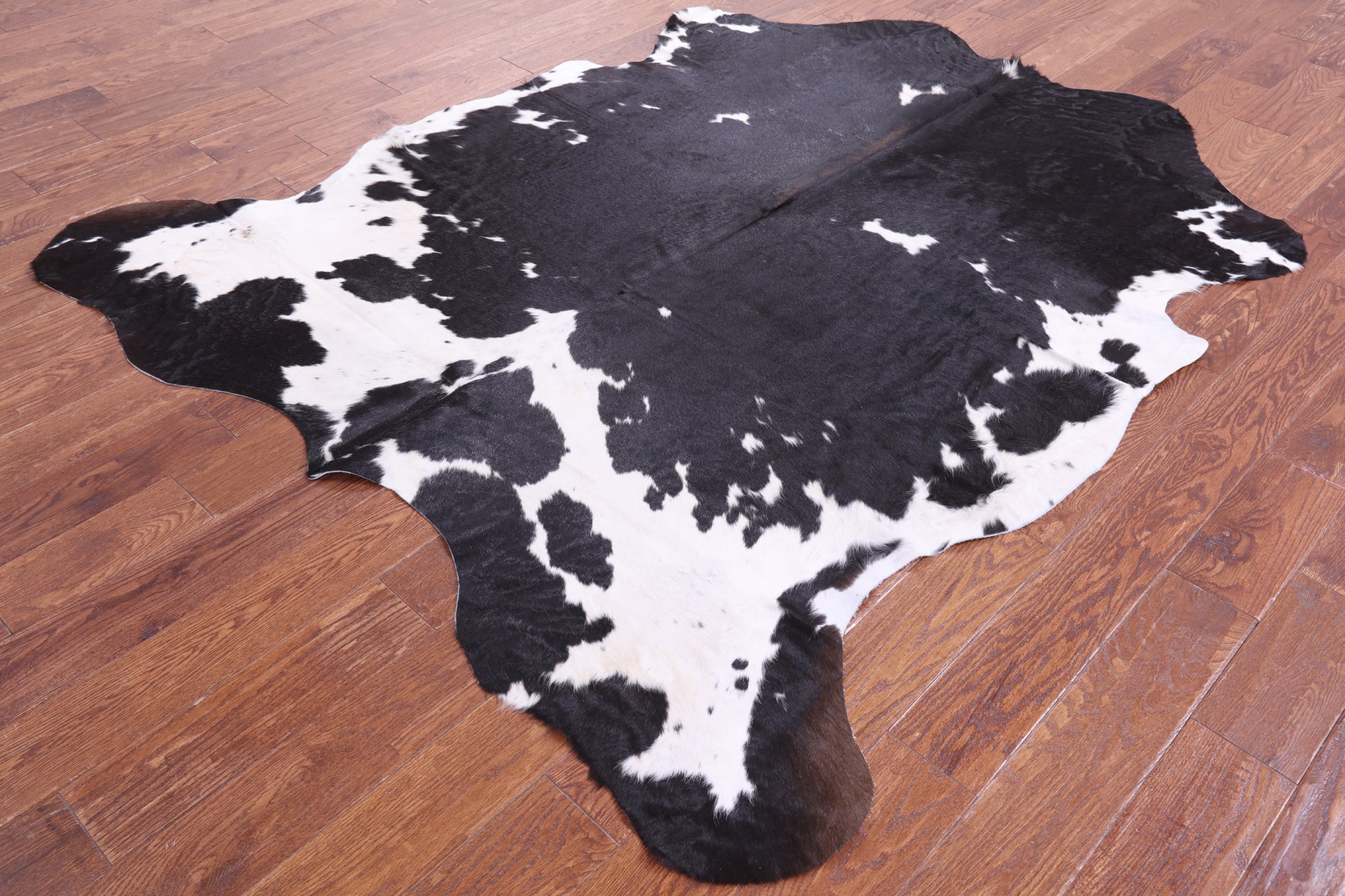 Black & White Natural Hair-On Cowhide Rug - 6' 11" X 6' 1" - Golden Nile