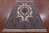 Ivory Persian Isfahan Signed Wool & Silk Rug - 5' 2" X 7' 9" - Golden Nile