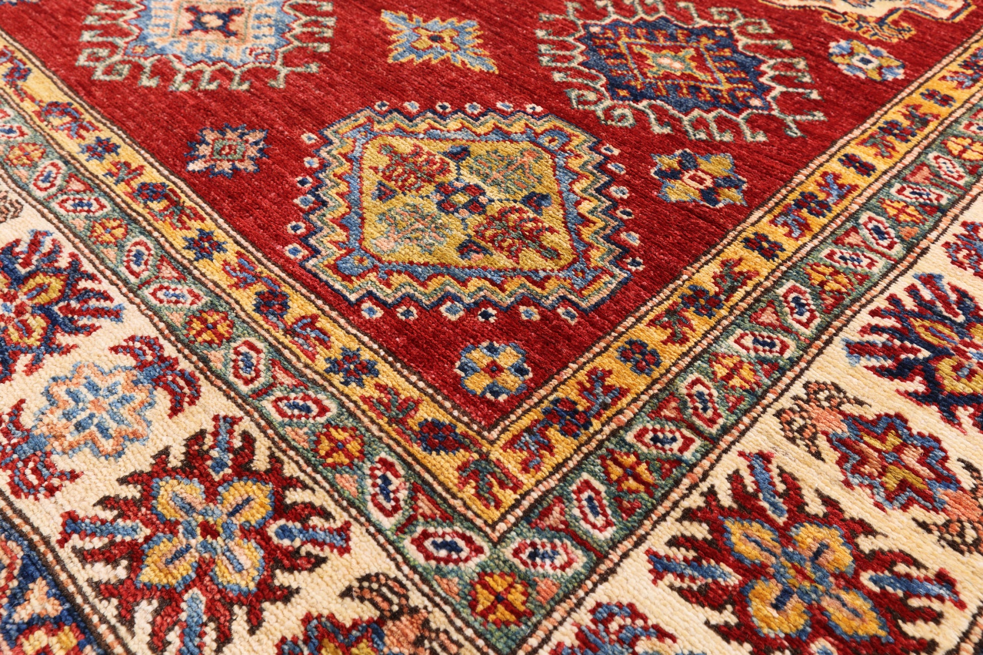 Red Super Kazak Handmade Area Rug - 4' 11" X 6' 9" - Golden Nile