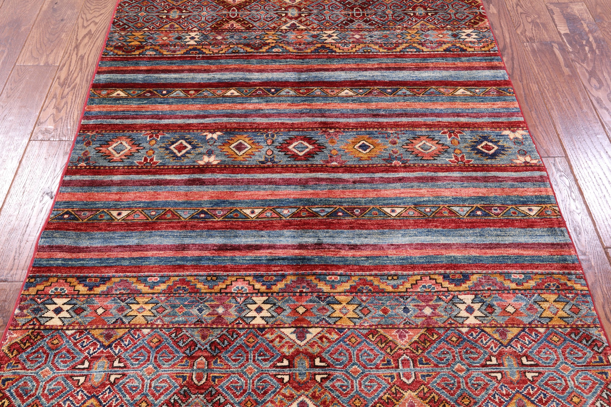 Khorjin Persian Gabbeh Handmade Wool Rug - 4' 0" X 5' 11" - Golden Nile